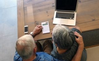 Older couple discussing finances